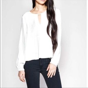 White Long Sleeved Keyhole Peplum Blouse